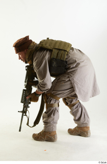 Photos Luis Donovan Army Taliban Gunner Poses crouching whole body…